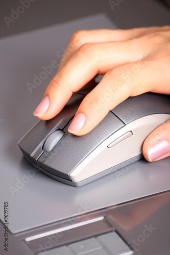Hand on mouse photo