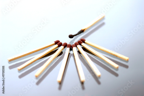 Fotografie extincted matches on a grey background as a hope concept