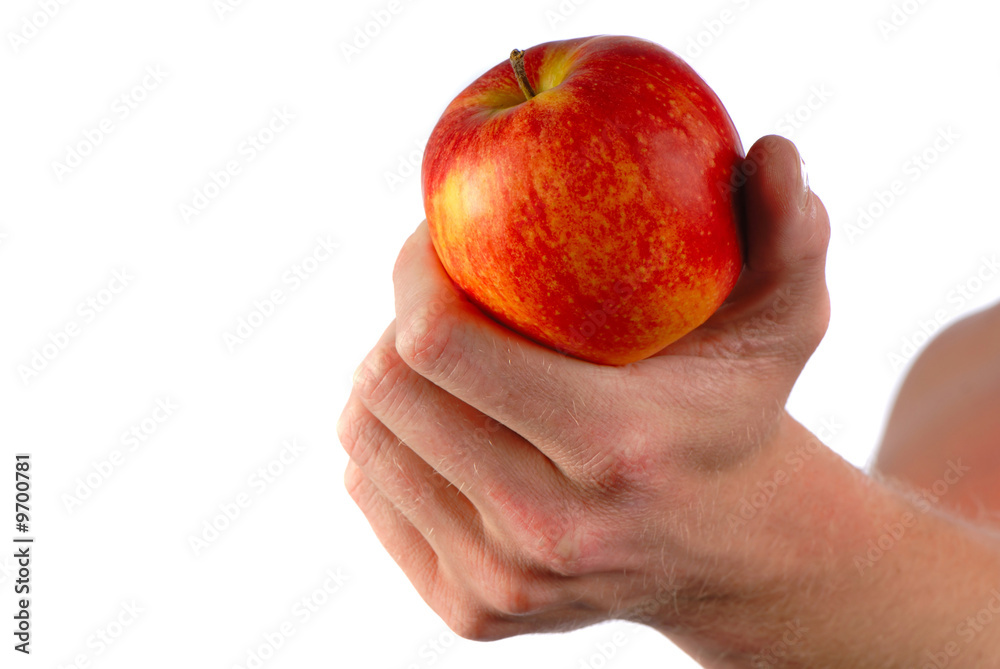 big red apple in  man's hand on  white background