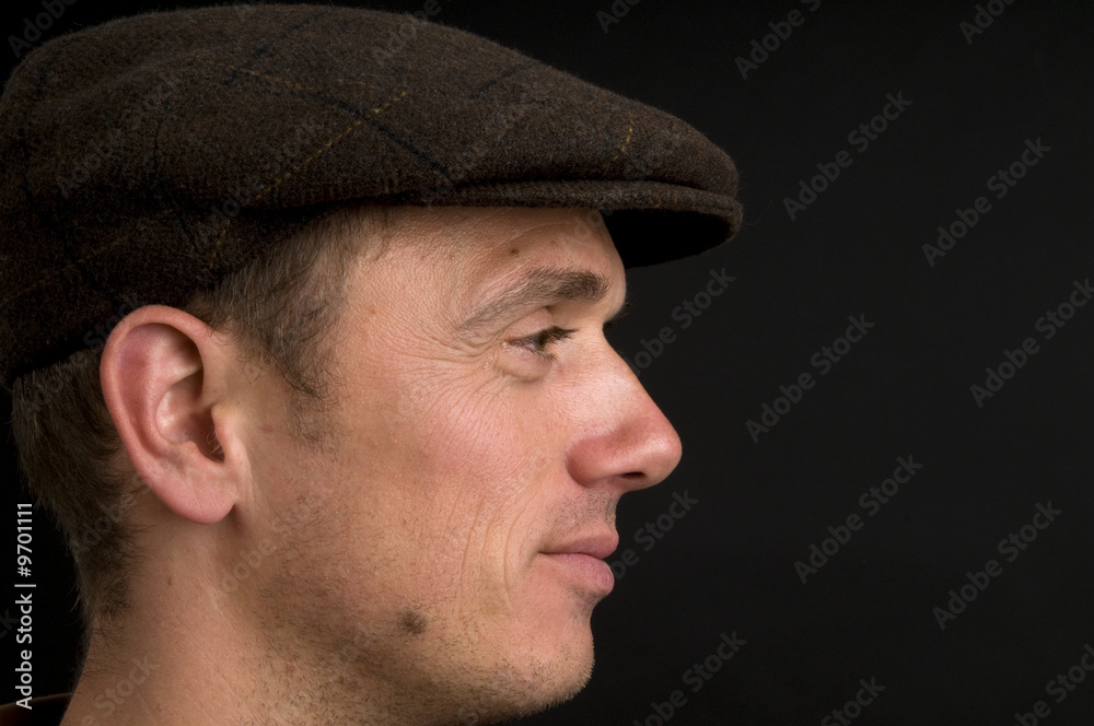 Portrait of an attractive young man with a hat. Portrait of an attractive young man with a hat.