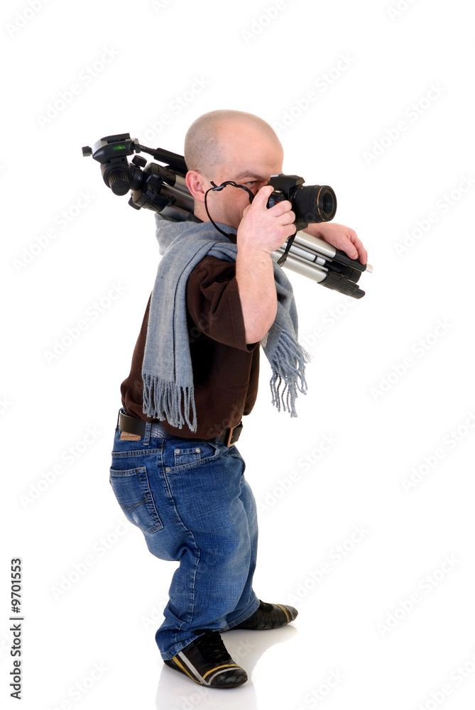 Little man, dwarf photographer with tripod and DSLR camera Little man, dwarf photographer with tripod and DSLR camera