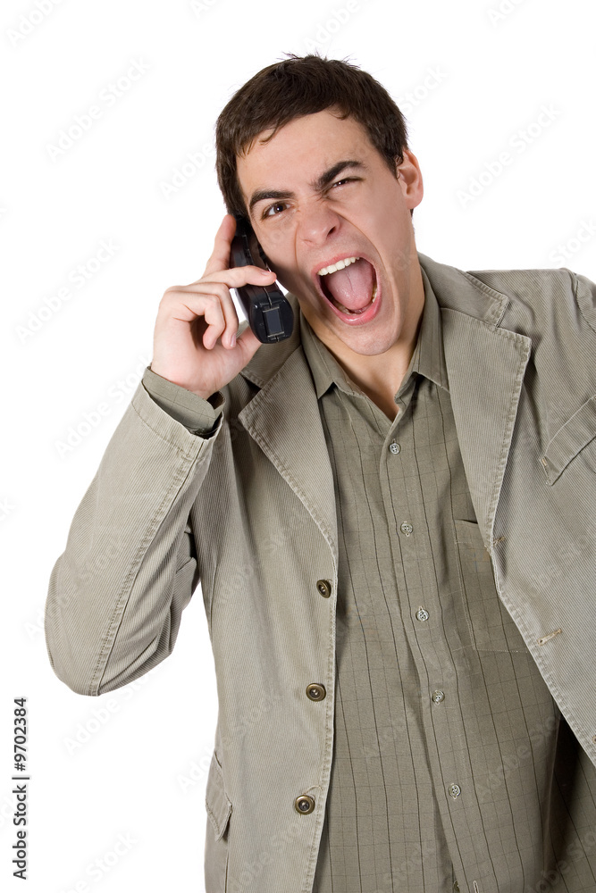 Young adult very angry, screaming on the phone Young adult very angry, screaming on the phone