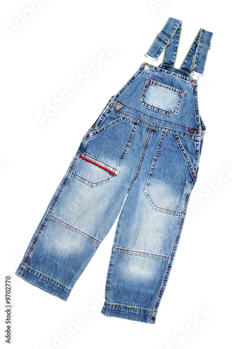 Children's wear - jean overalls isolated over white background