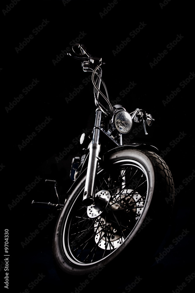 Naklejka premium Chopper motorcycle front isolated on black