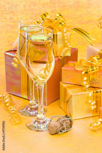 Decoration with gift boxes and champagne glasses