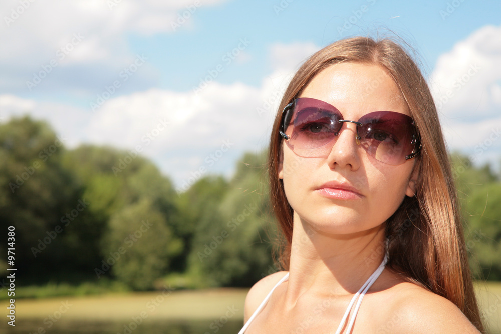 beauty young woman in sunglasses