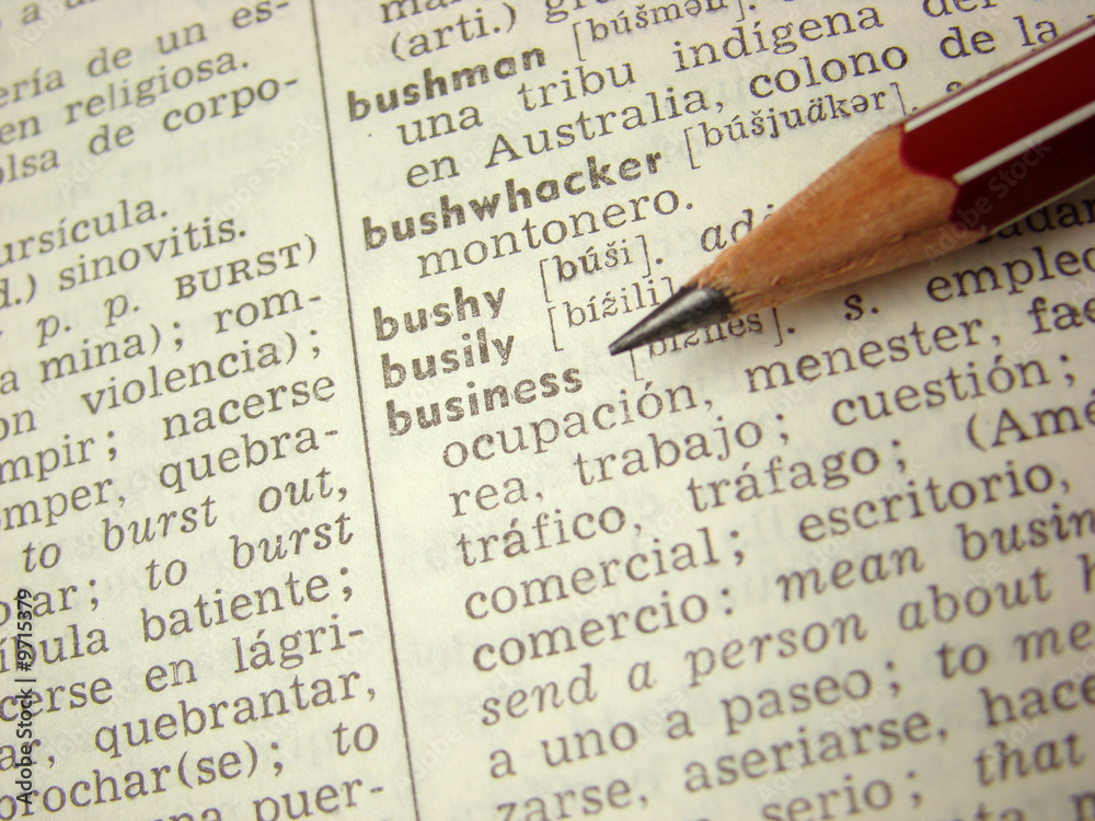 'business' word in english-spanish dictionary with pencil 'business' word in english-spanish dictionary with pencil
