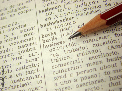 'business' word in english-spanish dictionary with pencil