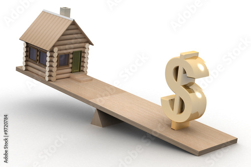 house and dollar on scales....