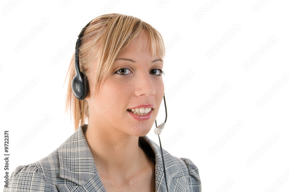 Closeup portrait of a happy pretty executive with headset Closeup portrait of a happy pretty executive with headset