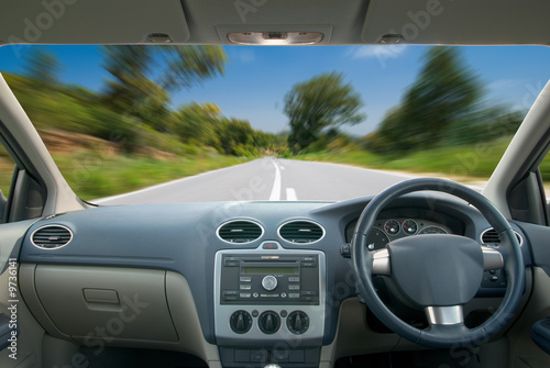 View of a mountain road from a vehicle interior