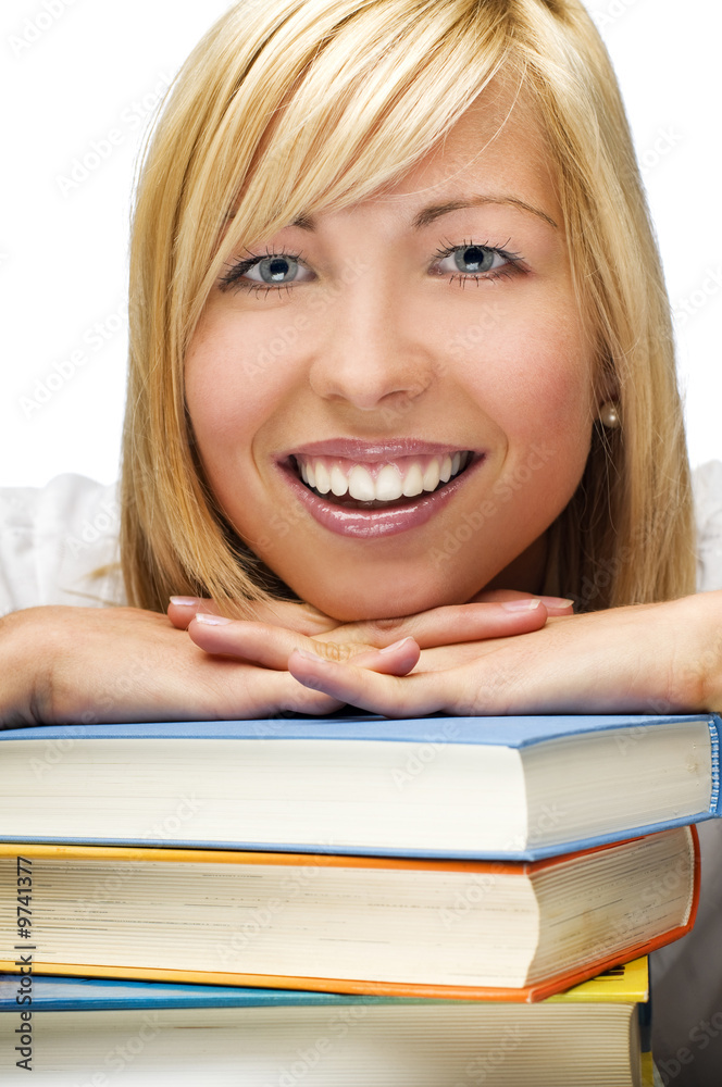 young blond woman with stack of books close up young blond woman with stack of books close up