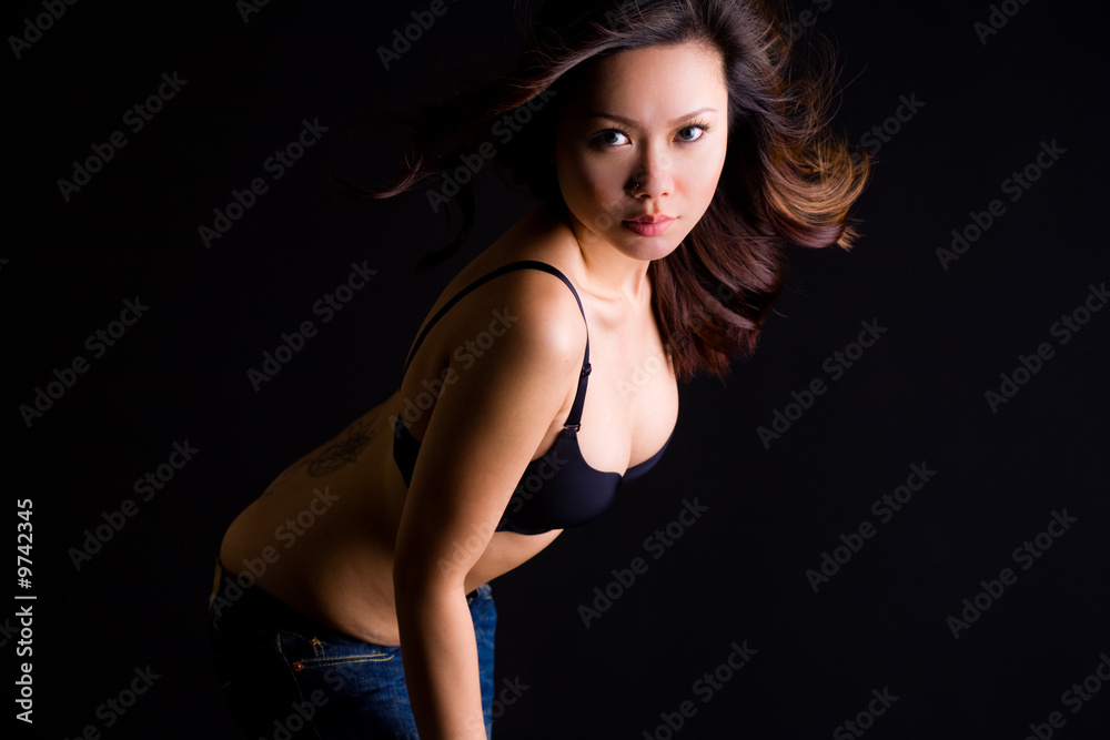glamourous sensual asian woman in black bra & jeans glamourous sensual asian woman in black bra & jeans