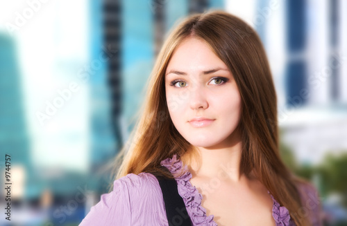 Young woman in a city portrait.