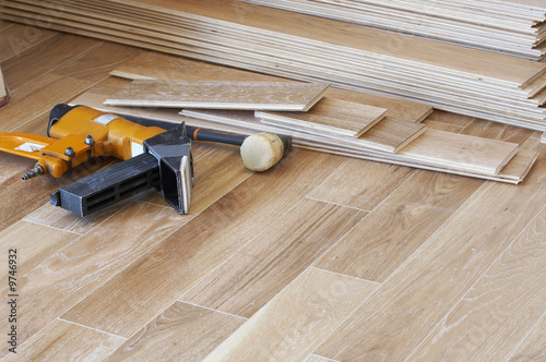 a picture of wood flooring and tools