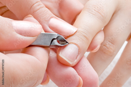 Tableau sur toile nail salon, manicure applying  - cuticle cutting