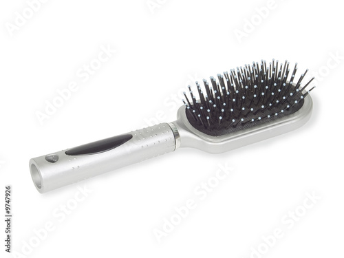 Massage hairbrush isolated on a white background