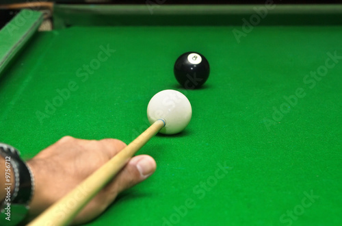 Playing snooker