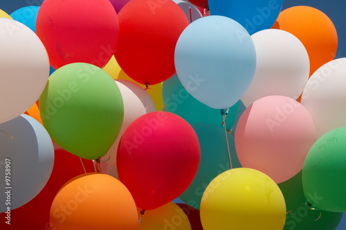 Countless colorful balloons flying in deep blue sky