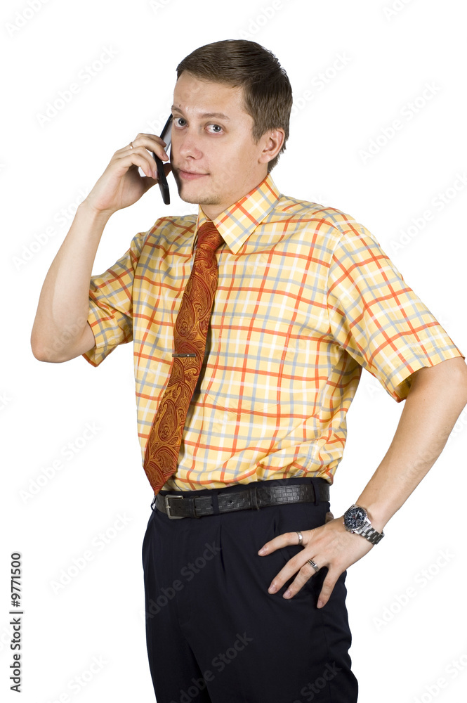Young, elegant European businessman, talking on phone Young, elegant European businessman, talking on phone