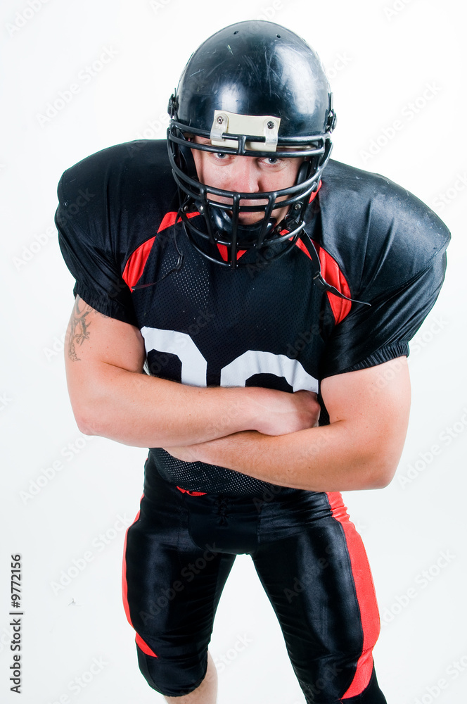 American football player in helmet, studio isolated American football player in helmet, studio isolated