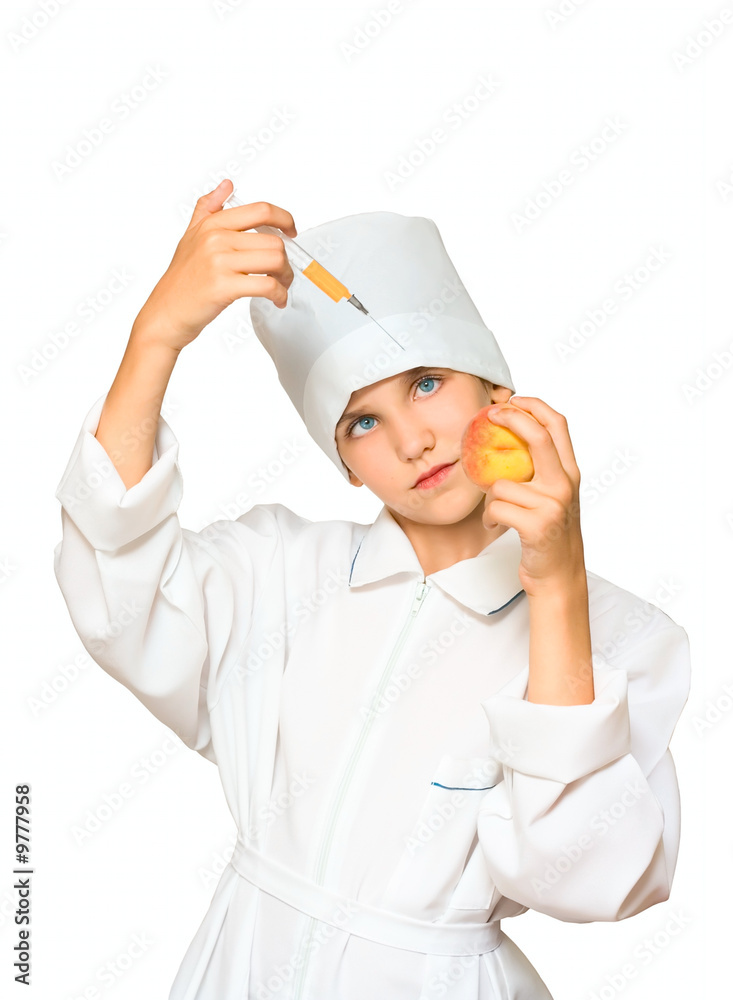 Medical student girl with syringe and peach isolated on white Medical student girl with syringe and peach isolated on white