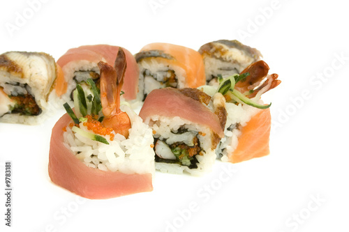 Sushi rolls with rice, shrimp, salmon, tuna