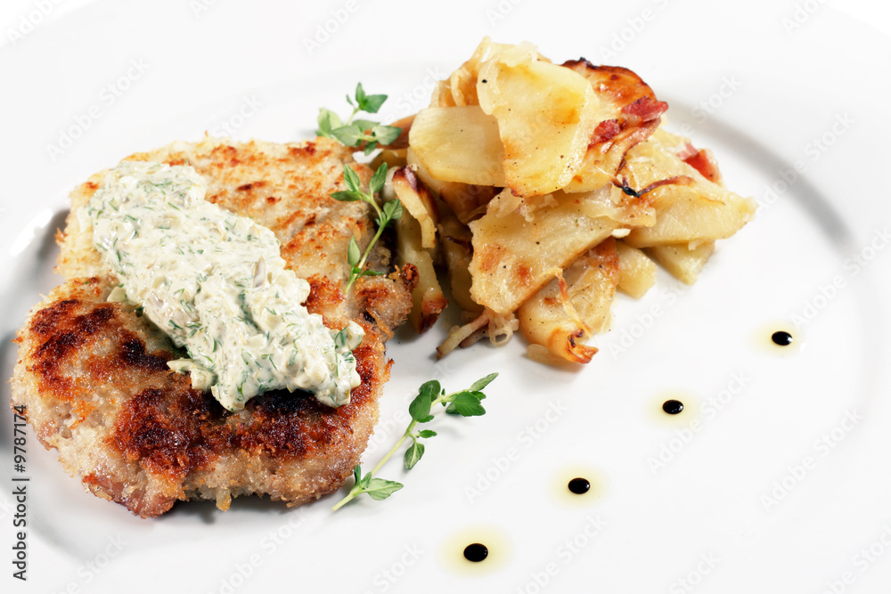 Pork Schnitzel with Fried Potato and Sauce Tartar Pork Schnitzel with Fried Potato and Sauce Tartar