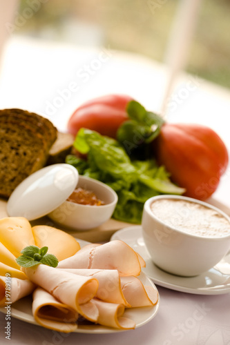 Tasty breakfast / Coffee, bread, cheese, ham, jam