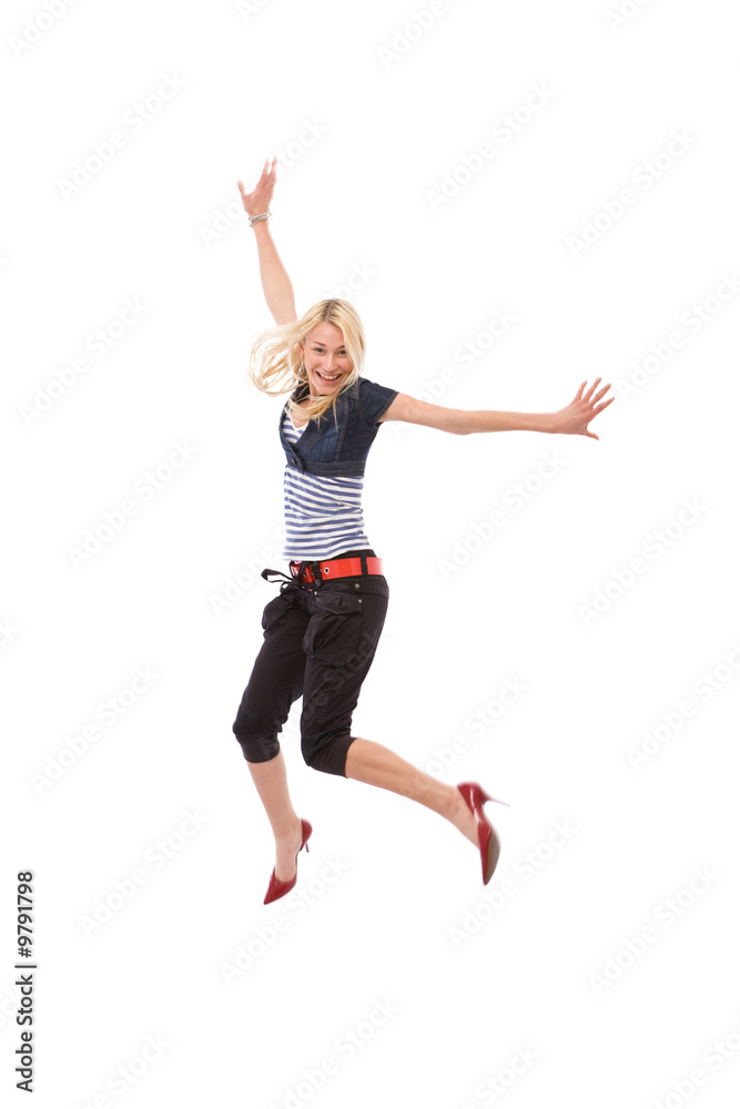 beautiful and happy woman jumping high on white background