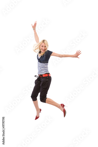beautiful and happy woman jumping high on white background