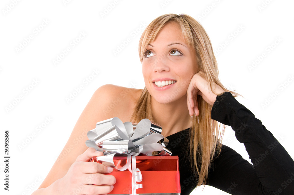 Beautiful smiling girl looks up thinking about a present. Beautiful smiling girl looks up thinking about a present.