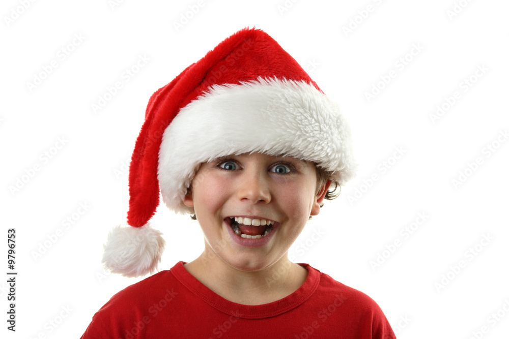 Christmas time - boy with Santa's hat isolated on white Christmas time - boy with Santa's hat isolated on white