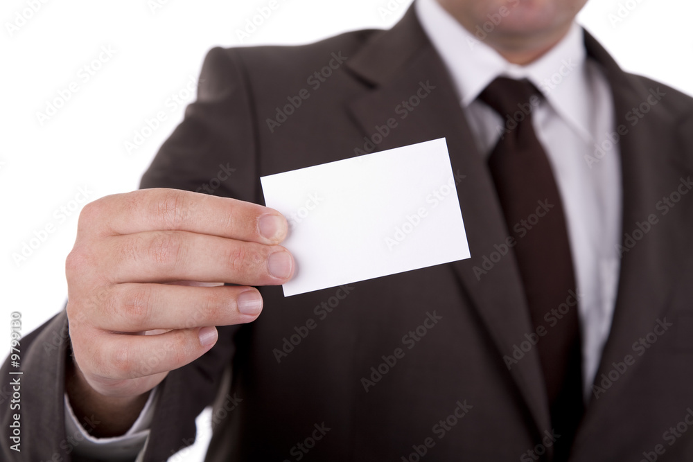 Businessman showing his business card, focus on fingers Businessman showing his business card, focus on fingers