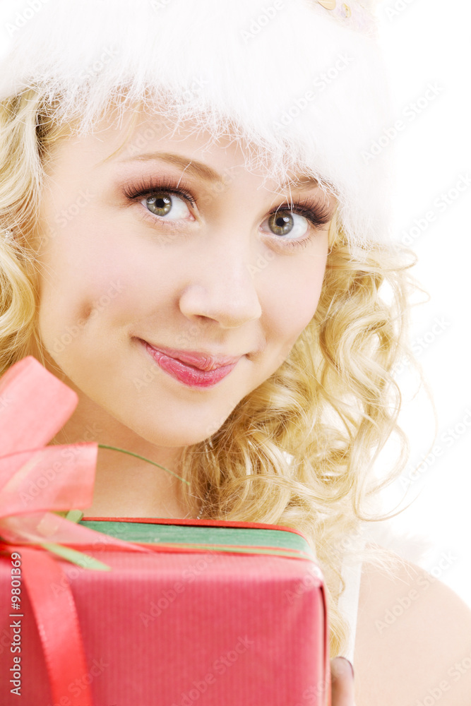 picture of cheerful santa helper girl with gift box picture of cheerful santa helper girl with gift box