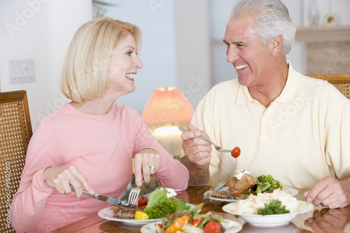 фотографія Elderly Couple Enjoying Healthy meal,mealtime Together