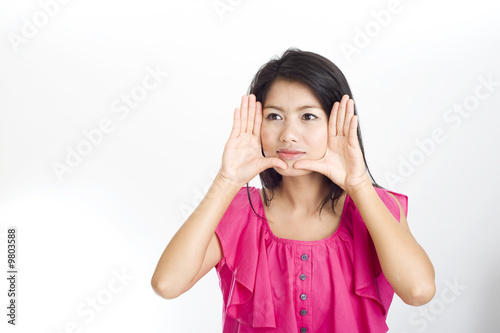 young asian woman framed face