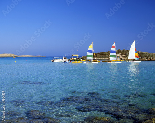 Bright pleasure sailboats, Nissi Beach, Cyprus
