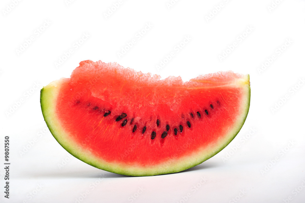 A slice of watermelon on white background, close up A slice of watermelon on white background, close up