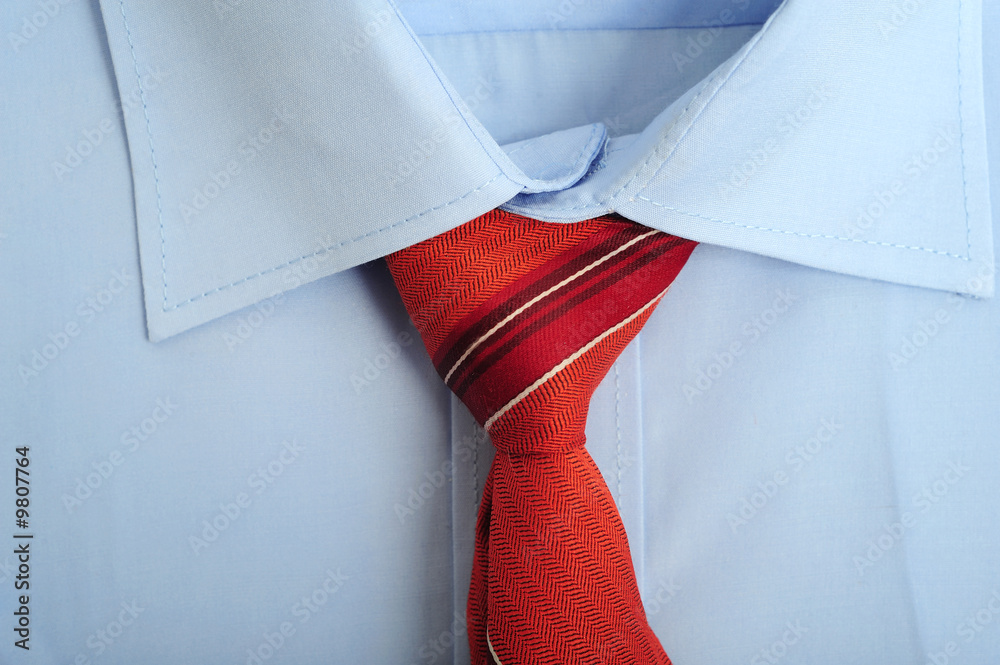 Close up of a shirt with red tie Close up of a shirt with red tie