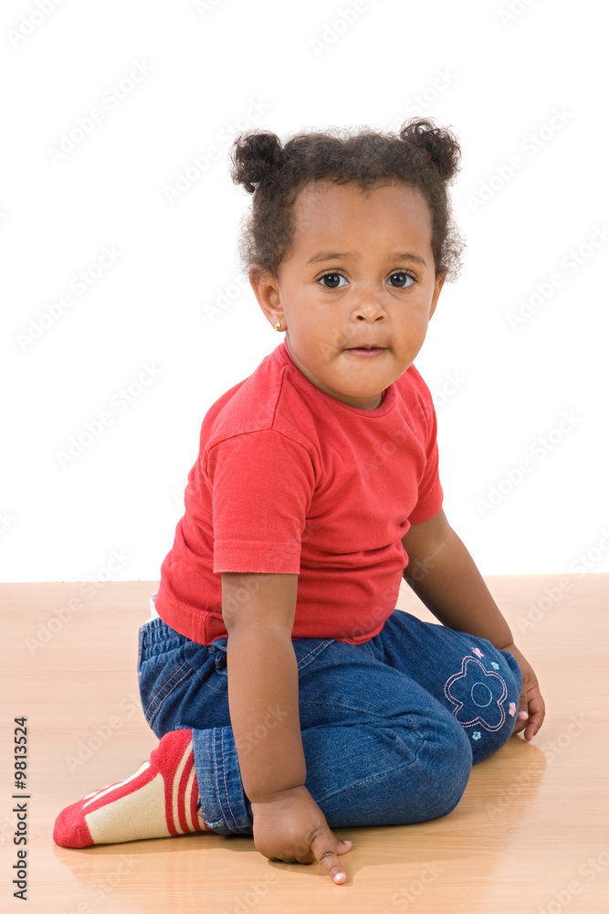 Adorable african baby stand over wooden floor Adorable african baby stand over wooden floor