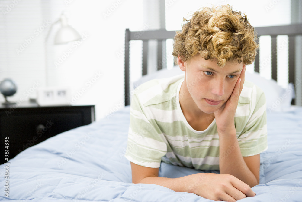 Teenage Boy Lying On Bed Teenage Boy Lying On Bed