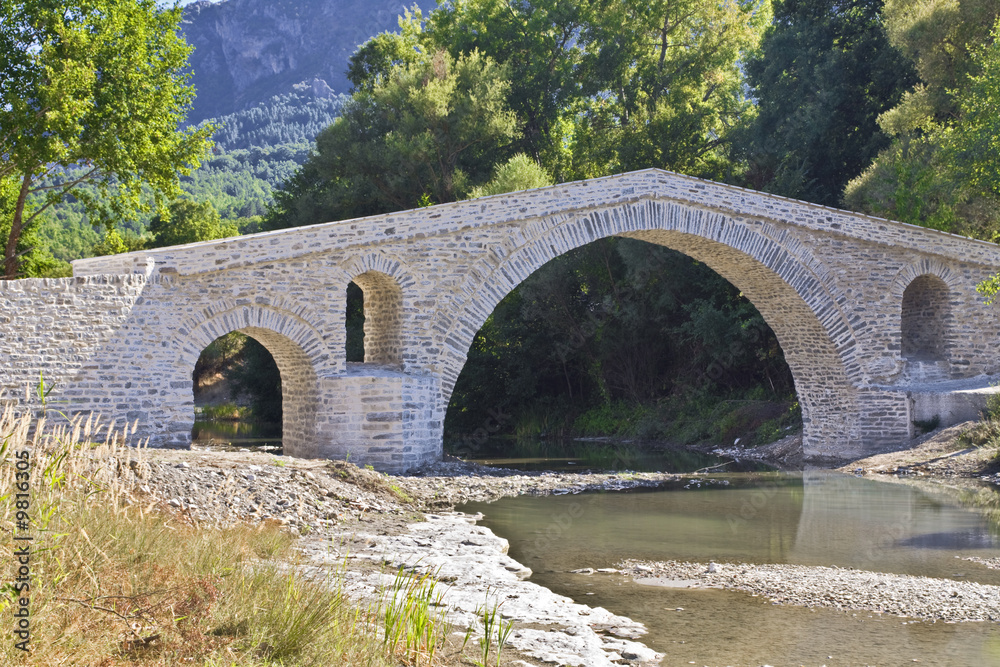 Old alike stone bridge at Greece