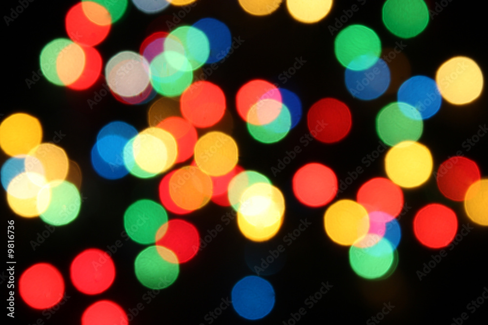 Colorful dots background made of bokeh fairy lights Colorful dots background made of bokeh fairy lights