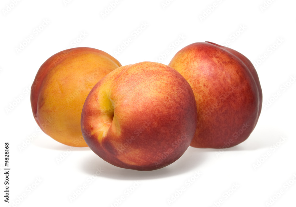 three peaches on white background three peaches on white background