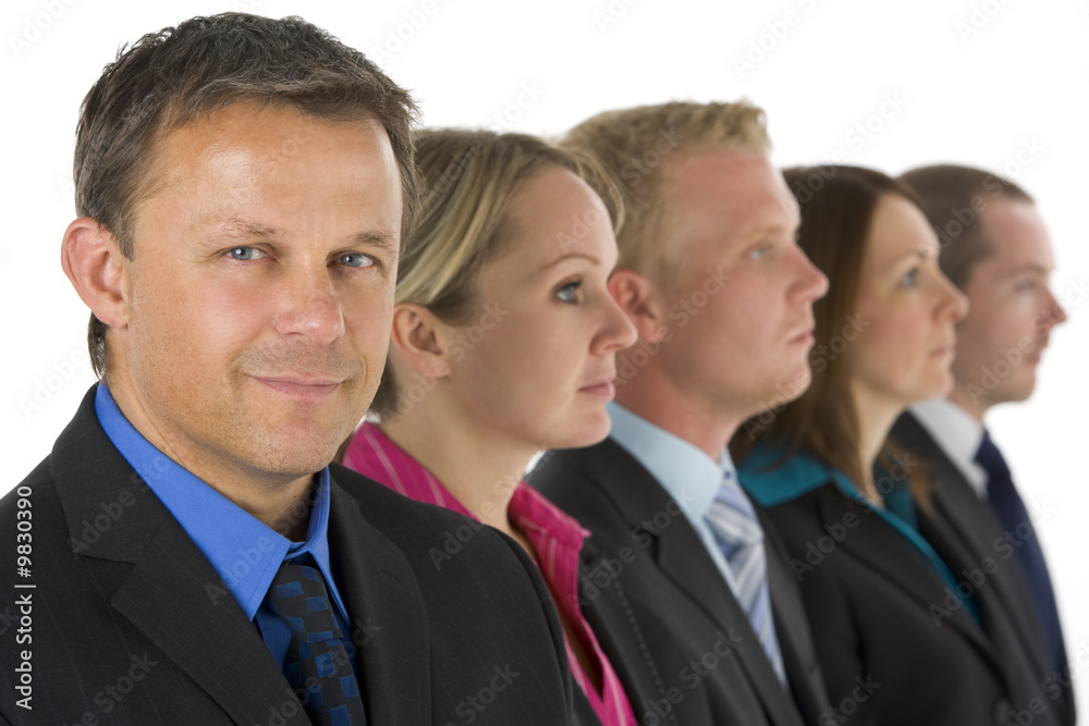 Group Of Business People In A Line Looking Group Of Business People In A Line Looking