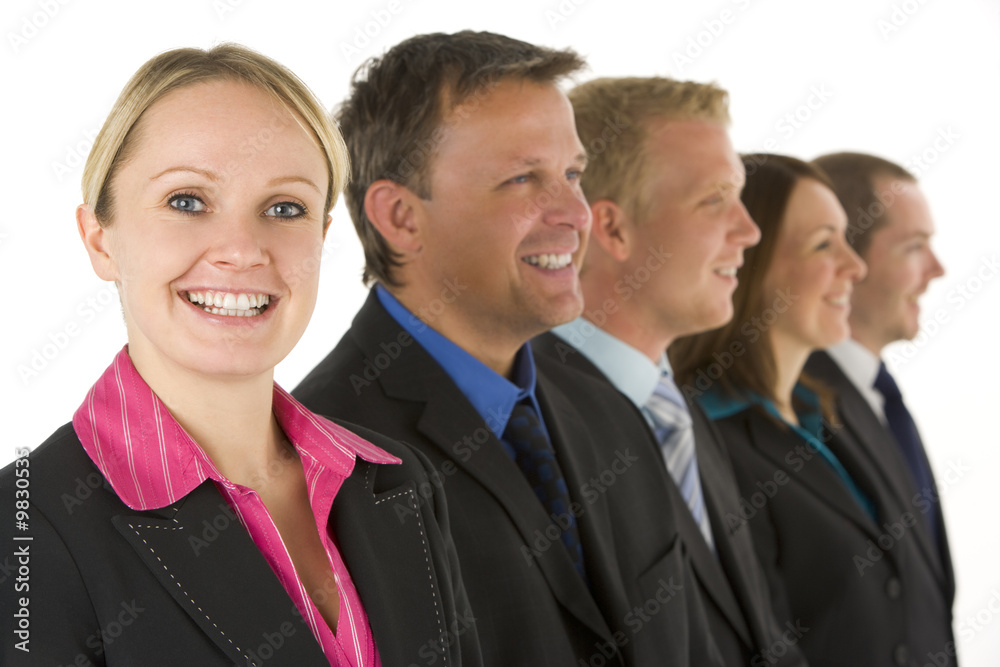 Group Of Business People In A Line Smiling Group Of Business People In A Line Smiling