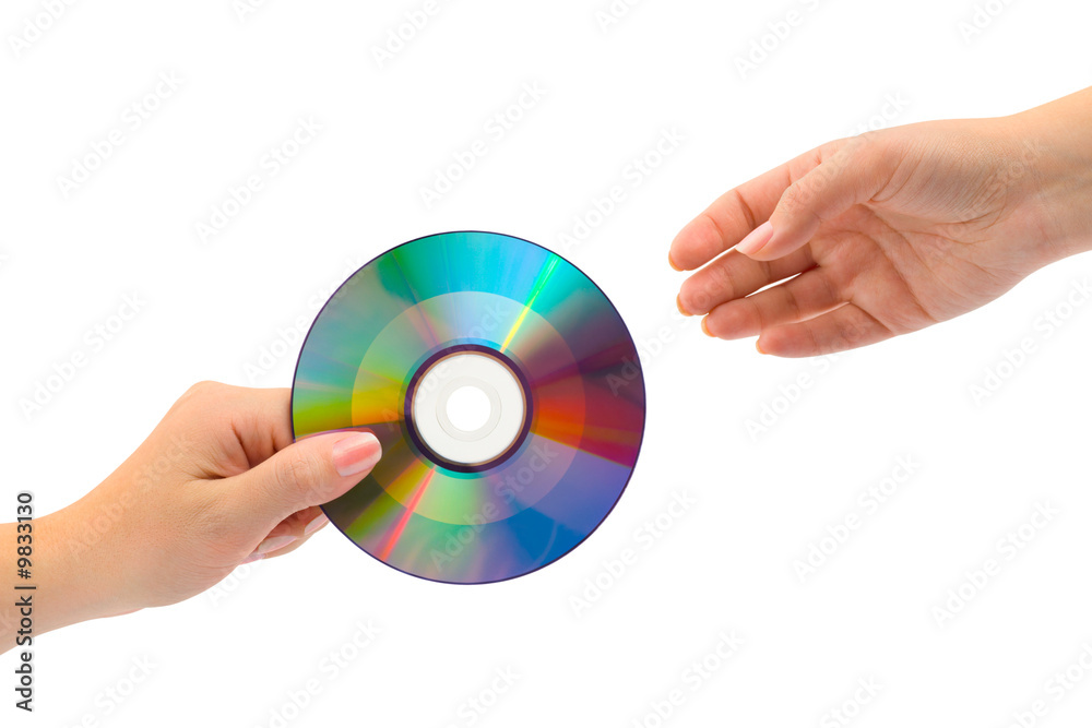 Hands with computer disk isolated on white background Hands with computer disk isolated on white background