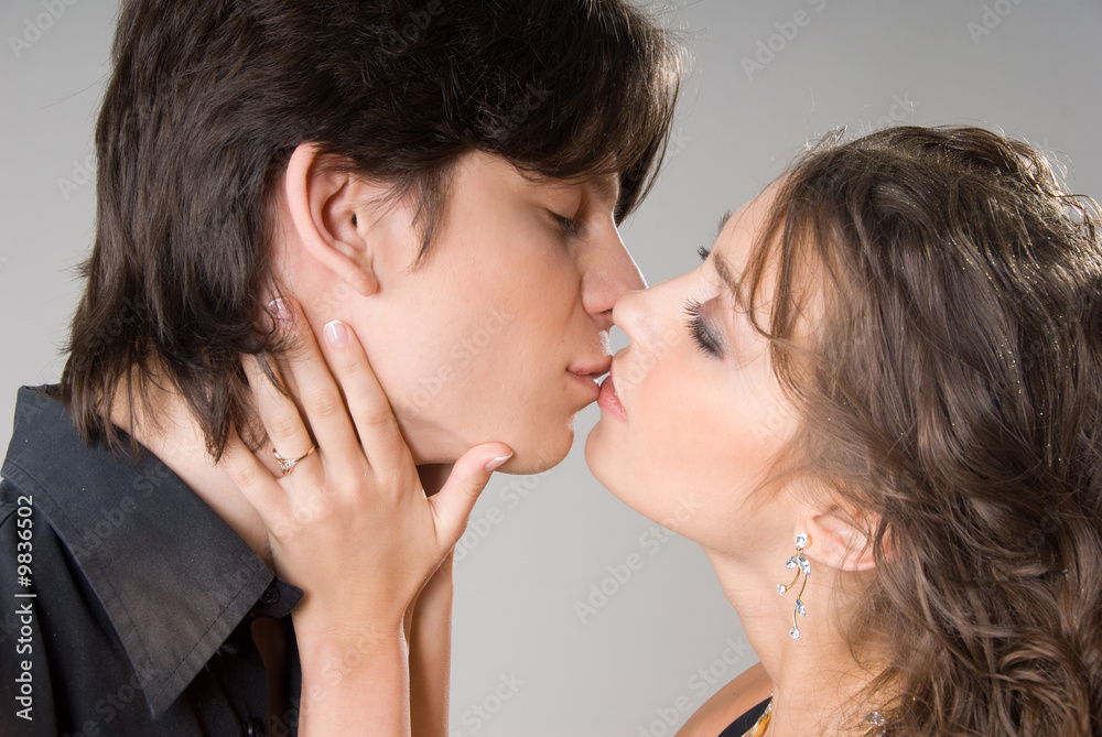 young attractive amorous kissing couple young attractive amorous kissing couple