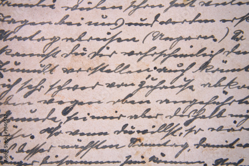 detail of very old historical letter as background